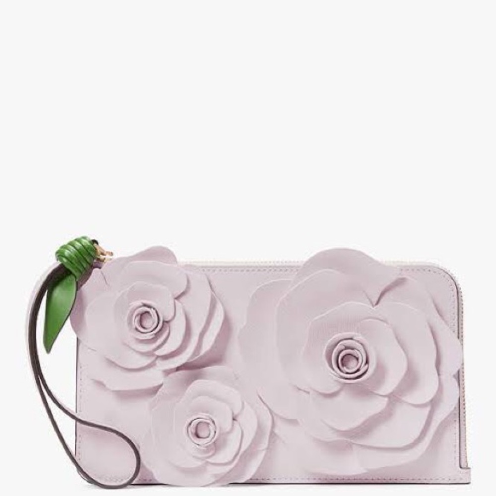 Authentic Kate Spade zip wristlet. New with tag.